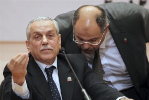 Farouk Sultan, head of the presidential election commission speaks with Hatem Bagato Egypt's Supreme Presidential Electoral Commission (SPEC) General Secretary during a news conference in Cairo