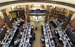 Traders work at the Egyptian Stock Exchange in Cairo