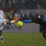 Egypt's Hefny fights for the ball with Mongala of Botswana during their African Nations Cup qualifying soccer match in Cairo