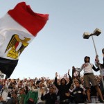 Fans cheer Egypt's Zamalek team before their African Champions League soccer match against Kenya's Ulinzi Stars at the Military Stadium in Cairo
