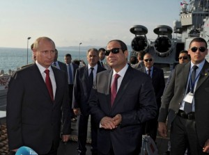Russia's President Putin and his Egyptian counterpart Sisi stand on the deck of guided missile cruiser Moskva at Sochi