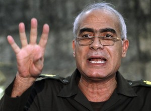General Mamdouh Shaheen, a member of the military council, speaks during a news conference at the military media centre in Cairo