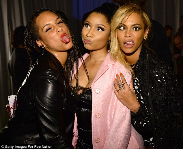 Silly stars! Beyonce swapped her usually cool composure for a bout of goofiness as she posed backstage at the launch of the Tidal streaming service along with Alicia Keys and Nicki Minaj in New York on Monday