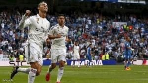 Real Madrid's Cristiano Ronaldo celebrates his goal during their Spanish first division soccer match against Getafe at Santiago Bernabeu stadium in Madrid