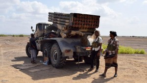 Fighters loyal to Yemeni President Abedrabbo Mansour Hadi rest next to a multiple rocket launcher in Bab al-Mandab, in the southern Yemeni province of Taez, on October 1, 2015. Pro-Hadi forces backed by the Saudi-led coalition, seized Bab al-Mandab and Dhubab in Taez province near the strait at the entrance to the Red Sea, loyalist military official Abedrabbo al-Mihwali told AFP.  AFP PHOTO / SALEH AL-OBEIDI        (Photo credit should read SALEH AL-OBEIDI/AFP/Getty Images)