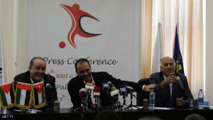 TO GO WITH AFP STORY BY HUSSAM EIZZ ELDIEN Palestinian Football Association chairman Jibril Rajoub (R) and FIFA Vice-President Prince Ali bin al-Hussein from Jordan (C) attend a press conference prior to the U-16 West Asian Football Championship match at Faisal Al-Husseini International Stadium, in Al-Ram near Jerusalem on August 18, 2013. Jordan, Iraq, UAE and Palestine are the teams participating in the four day tournament. AFP PHOTO/ABBAS MOMANI        (Photo credit should read ABBAS MOMANI/AFP/Getty Images)