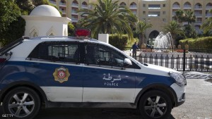 A Tunisian police car patrols in front of the Riu Imperial Marhaba Hotel in Port el Kantaoui, on the outskirts of Sousse south of the capital Tunis, on June 27, 2015, in the aftermath of a shooting attack on the beach resort claimed by the Islamic State group. The IS group on June 27 claimed responsibility for the massacre in the seaside resort that killed nearly 40 people, most of them British tourists, in the worst attack in the country's recent history. AFP PHOTO / KENZO TRIBOUILLARD        (Photo credit should read KENZO TRIBOUILLARD/AFP/Getty Images)