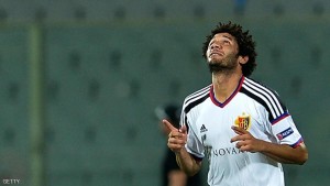 Basel's midfielder Mohamed Elneny celebrates after scoring during the UEFA Europa League football match between Fiorentina and Basel on September 17, 2015, at the Artemio Franchi Stadium in Florence.  AFP PHOTO / TIZIANA FABI        (Photo credit should read TIZIANA FABI/AFP/Getty Images)