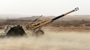 Saudi soldiers from an artillery unit prepare a cannon to fire shells towards Yemen from a position  close to the Saudi-Yemeni border, in Saudi Arabia's southwestern Jizan province, on April 13, 2015. Saudi Arabia is leading a coalition of several Arab countries which since March 26 has carried out air strikes against the Shiite Huthis rebels, who overran the capital Sanaa in September and have expanded to other parts of Yemen. AFP PHOTO / FAYEZ NURELDINE        (Photo credit should read FAYEZ NURELDINE/AFP/Getty Images)