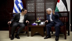 Greek Prime Minister Alexis Tsipras (L) meets Palestinian President Mahmoud Abbas in the West Bank city of Ramallah November 26, 2015. REUTERS/Majdi Mohammed/Pool - RTX1VYWK