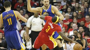 Dec 31, 2015; Houston, TX, USA; Houston Rockets guard Ty Lawson (3) dribbles past Golden State Warriors forward James Michael McAdoo (20) in the second half at Toyota Center. The Warriors won 114 to 110. Mandatory Credit: Thomas B. Shea-USA TODAY Sports