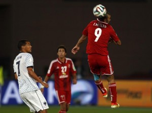 Emad Mettab (R) of Egypt's Al Ahly heads the ball as Lucas Silva of Mexico's Monterrey looks at him during their 2013 FIFA Club World Cup soccer match for fifth place in Marrakech stadium, December 18, 2013. REUTERS/Amr Abdallah Dalsh (MOROCCO - Tags: SPORT SOCCER)