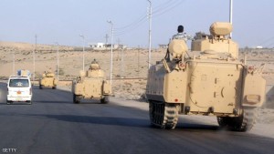 A convoy of Egyptian armoured vehicles head along a road in El-Arish on the Sinai Peninsula on the way to the city of Rafah near the Gaza border on August 13, 2011, in support of an operation against militants. Egyptian troops moved into a town on the Gaza border on August 13 for an anticipated operation against militants who attacked a gas pipeline to Israel and police stations, security officials said. AFP PHOTO (Photo credit should read STR/AFP/Getty Images)