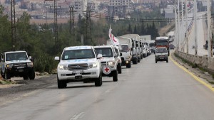 Aid convoys carrying food, medicine and blankets, leave the Syrian capital Damascus as they head to the besieged town of Madaya on January 11, 2015.  Aid convoys prepared to enter the besieged Syrian town of Madaya, which is blockaded by the Syrian regime, where more than two dozen people have reportedly starved to death according to an aid official, at the same time as convoys carrying aid for another two Syrian towns under rebel siege, Fuaa and Kafraya.  / AFP / LOUAI BESHARA