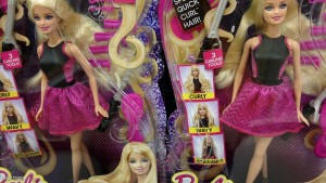 Barbie "Endless Curls" dolls are seen in the toy department of a retail store in Encinitas, California in this October 14, 2014, file photo.  Mattel Inc is expected to report Q4 earnings February 1, 2016.   REUTERS/Mike Blake/FilesGLOBAL BUSINESS WEEK AHEAD PACKAGE - SEARCH 'BUSINESS WEEK AHEAD FEBRUARY 1'  FOR ALL IMAGES