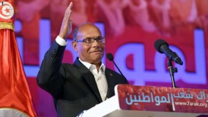 Tunisian former president Moncef Marzouki gestures to his supporters during a preparatory congress ahead of launching his new movement, called Harak Chaab al Mouatinine (Citizen People Movement) in Tunis, on April 25, 2015, four months after he lost a reelection bid. AFP PHOTO / FETHI BELAID        (Photo credit should read FETHI BELAID/AFP/Getty Images)