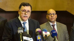 Libya's Prime Minister-designate, Fayez al-Sarraj (L) speaks during a press conference on February 15, 2016 in the Moroccan resort of Skhirat a day after after a UN-backed council of rival Libyan factions announced the formation of the revised cabinet. International efforts to end the chaos in Libya took a step forward as a new national unity government was proposed to lawmakers.  / AFP / STRINGER        (Photo credit should read STRINGER/AFP/Getty Images)