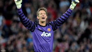 MANCHESTER, ENGLAND - MAY 04:  Edwin van der Sar of Manchester United celebrates after his team's second goal during the UEFA Champions League Semi Final second leg match between Manchester United and Schalke at Old Trafford on May 4, 2011 in Manchester, England.  (Photo by Michael Regan/Getty Images)