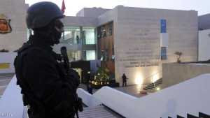A member of the Moroccan special forces guard stands outside of the Central Bureau of Judicial Investigation (BCIJ) building on March 23, 2015 during a press conference by the governor of the BCIJ in Rabat. Moroccan authorities said on March 23 that a "terrorist cell" they dismantled had brought in arms through the Spanish enclave of Melilla to carry out attacks for the Islamic State jihadist group. The cell was made up of 13 members aged between 19 and 37, most of them without primary school education, said Abdelhak Khiame, head of Morocco's newly-formed judicial investigations agency.         AFP PHOTO / STR        (Photo credit should read STR/AFP/Getty Images)