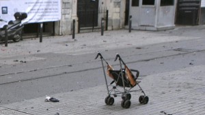 An abanonded childs pushchair stands in a street following a suicide bombing in a major shopping and tourist district in central Istanbul March 19, 2016. REUTERS/Kemal Aslan