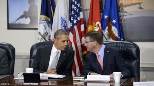 ARLINGTON, VA - DECEMBER 14:  U.S. President Barack Obama (L) and U.S. Defense Secretary Ash Carter talk during a national security council meeting on the counter-ISIL campaign at the Pentagon December 14, 2015 in Arlington, Virginia. Obama was expected to receive an update from his national security team and talk about ways to fight ISIL.  (Photo by Olivier Douliery-Pool/Getty Images)