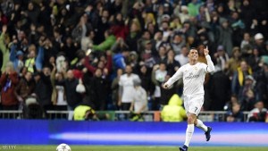 Real Madrid's Portuguese forward Cristiano Ronaldo celebrates after scoring a goal  during the Champions League quarter-final second leg football match Real Madrid vs Wolfsburg at Santiago Bernabeu stadium in Madrid on April 12, 2016. / AFP / JAVIER SORIANO        (Photo credit should read JAVIER SORIANO/AFP/Getty Images)