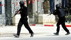 Tunisian security forces secure the area after gunmen attacked Tunis' famed Bardo Museum on March 18, 2015. At least seven foreigners and a Tunisian were killed in an attack by two men armed with assault rifles on the museum, the interior ministry said. AFP PHOTO / FETHI BELAID        (Photo credit should read FETHI BELAID/AFP/Getty Images)