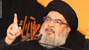 Head of Lebanon's Shiite movement Hezbollah, Hassan Nasrallah, delivers a speech in Beirut's southern suburbs on October 24, 2015, on the tenth day of the mourning period of Muharram, which marks the day of Ashura. Ashura mourns the death of Imam Hussein, a grandson of the Prophet Mohammed, who was killed by armies of the Yazid near Karbala in 680 AD. AFP PHOTO / ANWAR AMRO        (Photo credit should read ANWAR AMRO/AFP/Getty Images)